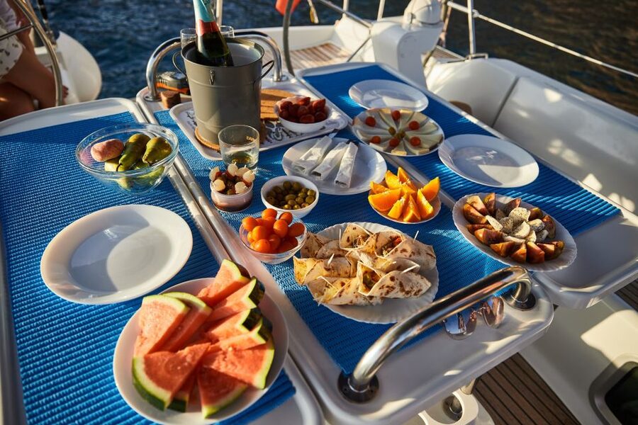 From Puerto de Mogán: Sailboat Trip with Food and Drinks - Lunch, drinks, and the value of the $100 price