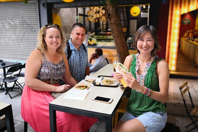 Get a Taste of Athens Food Tour - Walking Athinas Street toward the market