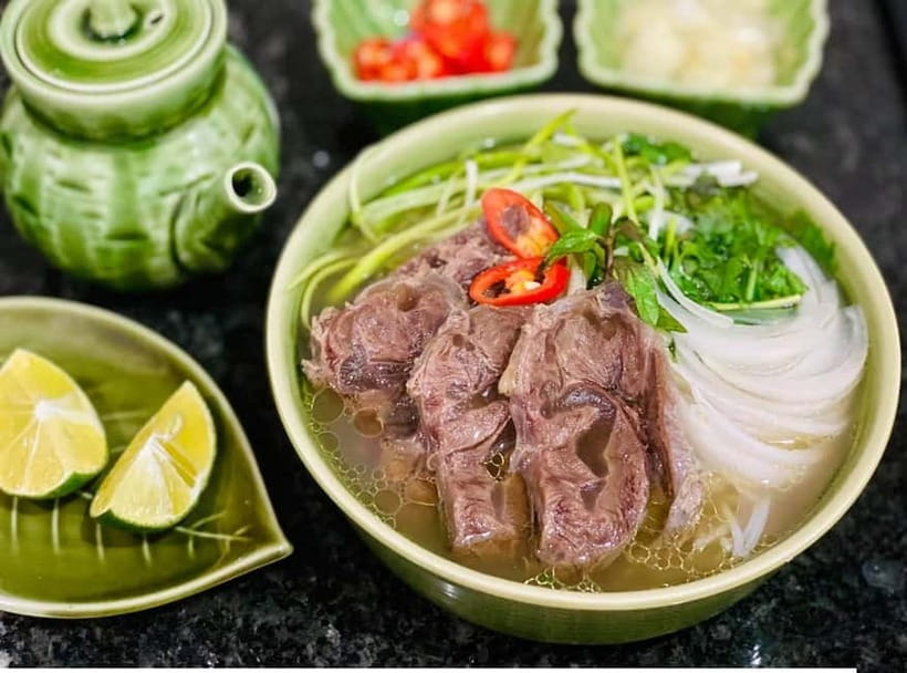 Hanoi: Street Food Tour with Train Street & Hidden Alleyways - Meeting in Tong Duy Tan and entering the Old Quarter
