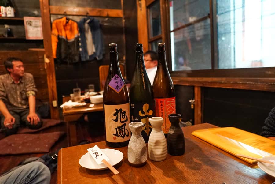 Hiroshima: Bar Hopping Food Tour - Trying Hiroshima sake with local food