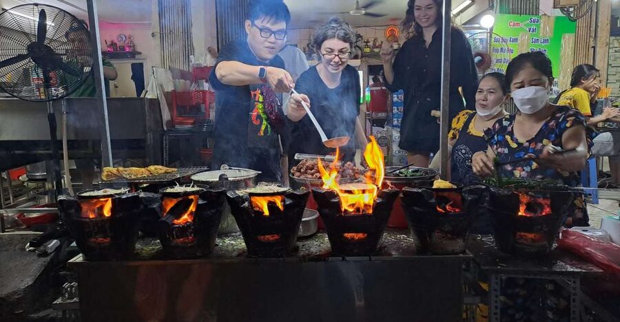 Ho Chi Minh City: Food Tour by Scooter with Eleven Tastings - Making bánh xèo and wrapping bò lá lốt