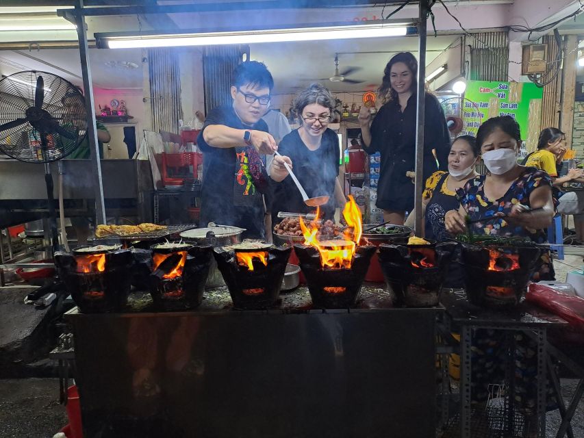 Ho Chi Minh City: Food Tour by Scooter with Eleven Tastings - The first ride and the opening sweet bite