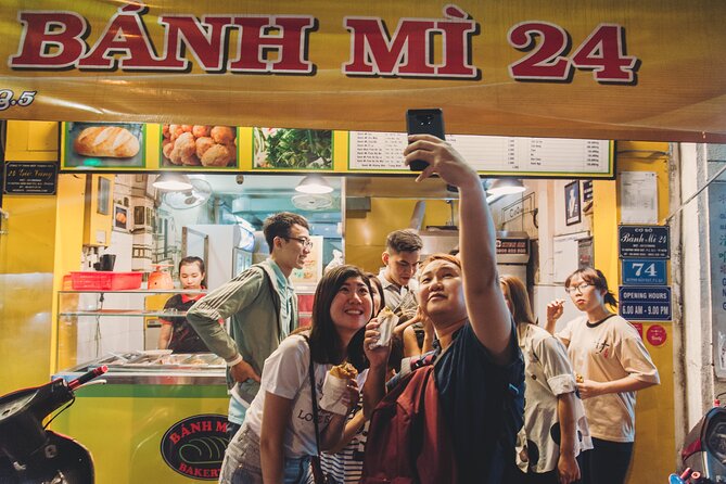 Ho Chi Minh City Street Food Tour & Sightseeing By Motorbike - Bún bò Huế starts the food trail