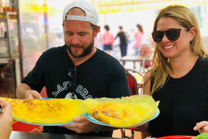 Ho Chi Minh City Street Food Tour & Sightseeing By Motorbike - Bánh khọt inside Nguyen Thien Thuat apartments