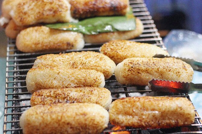 Ho Chi Minh City Street Food Tour & Sightseeing By Motorbike - Cambodian Market for snacks and local flavor