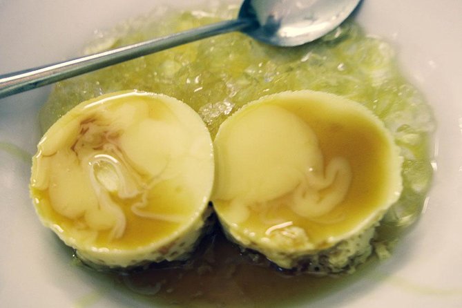 Ho Chi Minh City: Street Food Walking Tour with 12 Tastings - Sweet, smoky, and crisp: banana cake and Vietnamese pizza