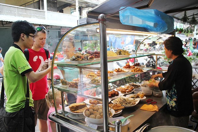 Ho Chi Minh City: Street Food Walking Tour with 12 Tastings - Sugarcane juice and fresh spring rolls