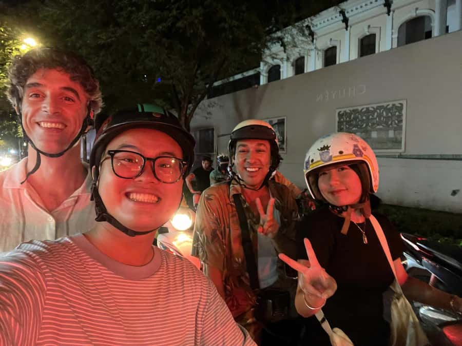 Ho Chi Minh: Local Food Tour by Scooter with Vegan Option - Vietnamese pizza and the fun of unfamiliar snacks