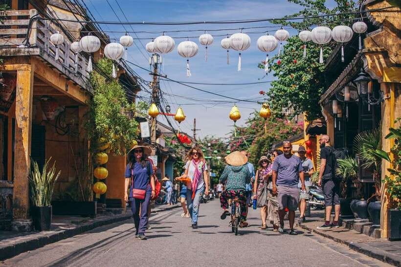 Hoi An: Sunset Food Tasting Tour - BBQ pork, rice paper, and fresh herbs at a small café