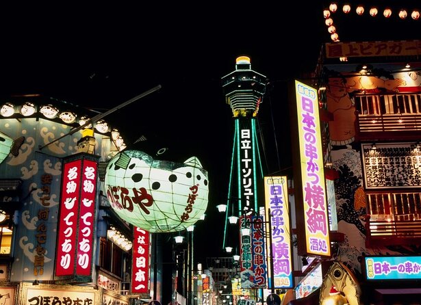 Hungry Osaka Street Food Tour:15 Tastings & 3 Drinks with a Local - The opening walk past Tsutenkaku