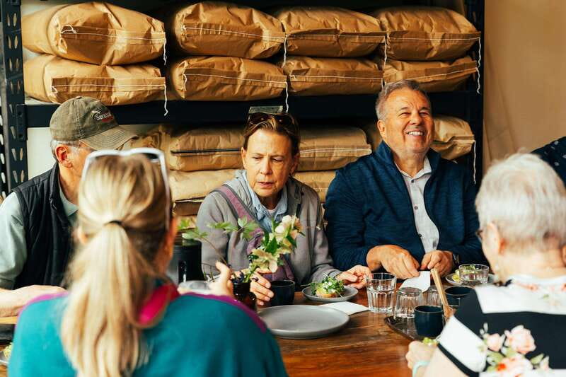 Kelowna: Walking Food Tour with 7 Tastings and 4 Drinks - Art, gardens, and the Cultural District