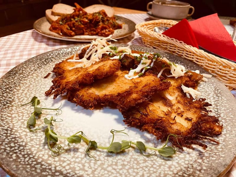 Krakow: 6-Course Full Polish Food Tour with Vodka Tasting - First tastes: cheese, soup, and Polish dumplings