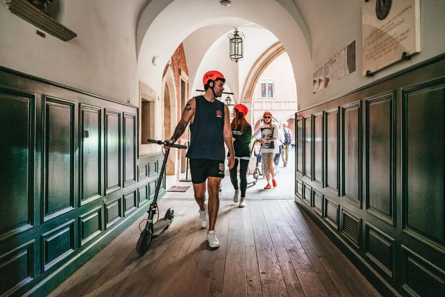 Krakow: Guided E-Scooter City Tour with Food Tastings - Wawel Castle, the dragon, and the Vistula