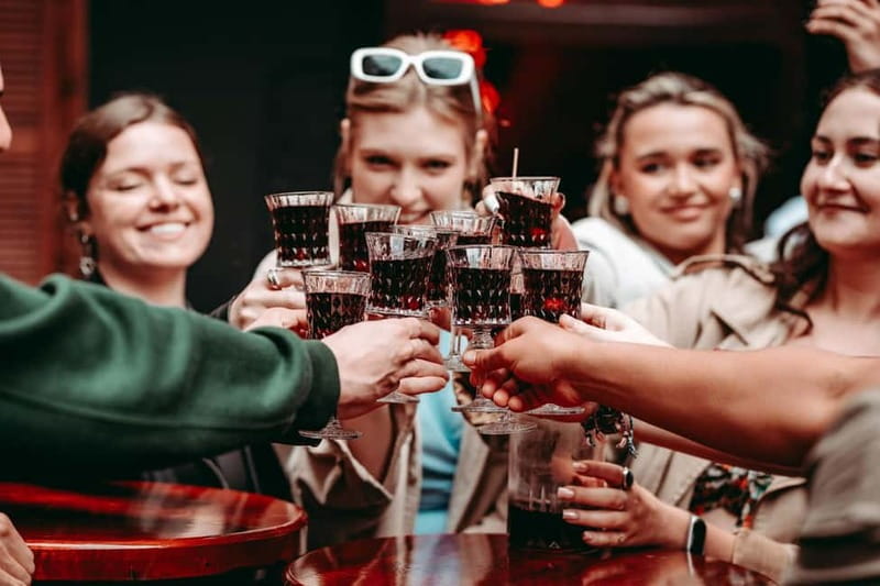 Krakow: Tipsy Polish Food Tour With History, Pierogi & Shots - Starting with pretzels and Polish welcome bites