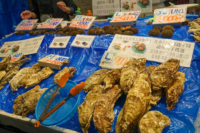 Kuromon Market Food Walking Tour in Osaka (6 stops, 6 tastes) - The guides make or break the experience