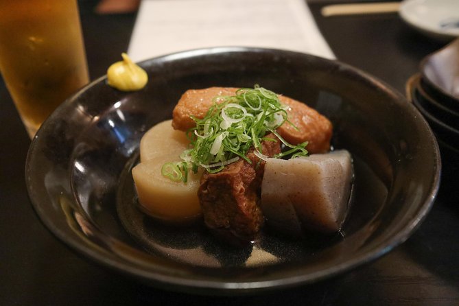 Kyoto Night Foodie Tour in Gion (9+ dishes + 6 Sake tastings) - Sake tasting at a standing bar