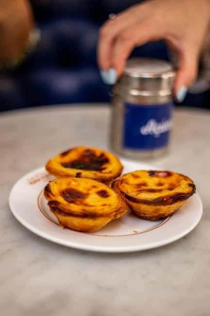 Lisbon: Food Tasting Tour by Tuk Tuk with 2 Stops - Graça supplies the views and a slower pause