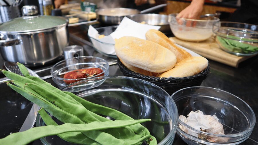 Lisbon: Portuguese street food cooking class with Drinks - The shared meal, wine, and Ginja