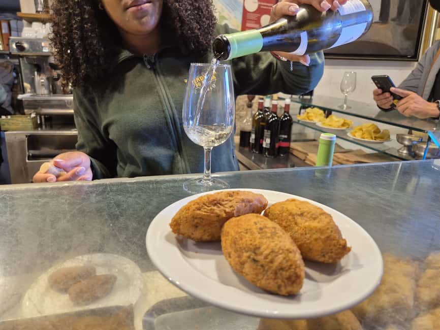 Lisbon Small-Group Food & Wine Tour Eat & Drink like a Local - Seafood rice with lobster