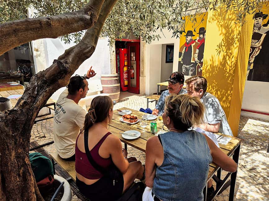 Lisbon Small-Group Food & Wine Tour Eat & Drink like a Local - Pastel de nata and a glass of port