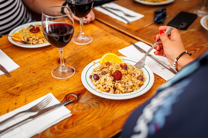 Lisbon Small-Group Portuguese Food and Wine Tour - Rua da Madalena serves Lisbon’s famous bifana