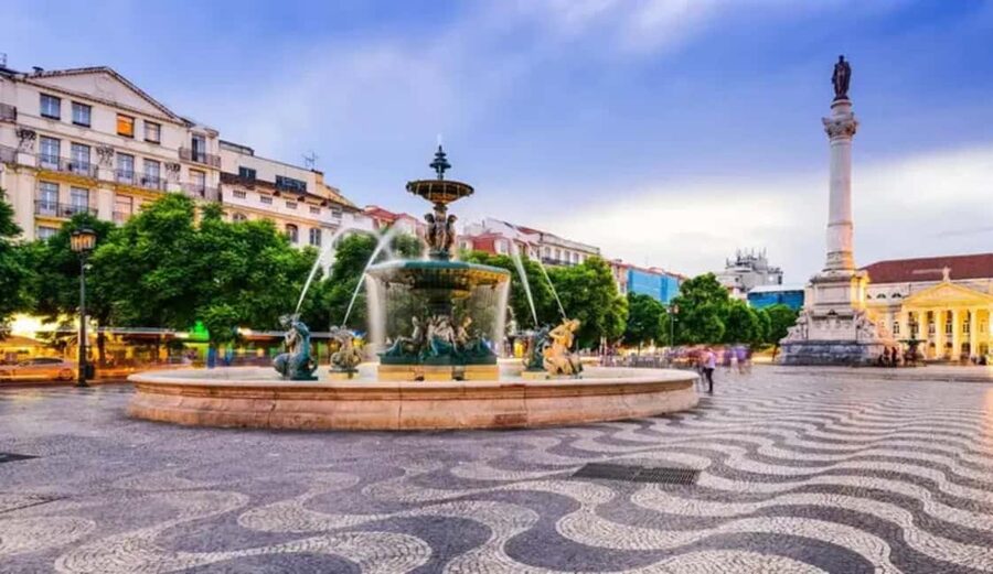 Lisbon Through the Eyes of a Local - Food and Walking Tour - Entering Alfama for ginjinha and chocolate