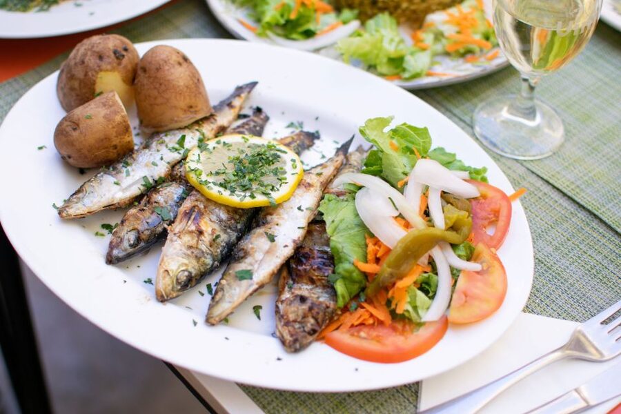 Lisbon Traditional Portuguese Food and Sightseeing Tour - The first restaurant and the Portuguese table