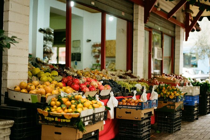Local food experience & walking tour of Tirana - Çam Bazaar and the practical side of local shopping