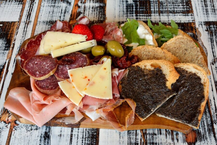 Lucca: Guided Food Walking Tour with Tastings - Tordelli at the main restaurant stop