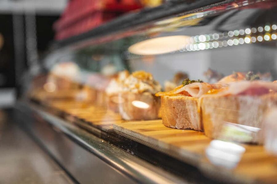 Madrid: Guided Food Tour with Authentic Tapas & Delicacies - Starting with tortilla, Manchego, and local tapas