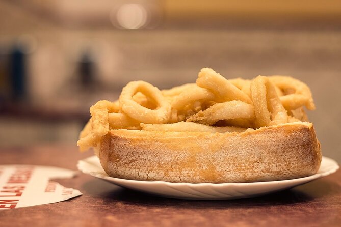 Madrid Historic Centre Food Tour with Authentic Tapas & Wines - The fried squid sandwich that belongs to Madrid