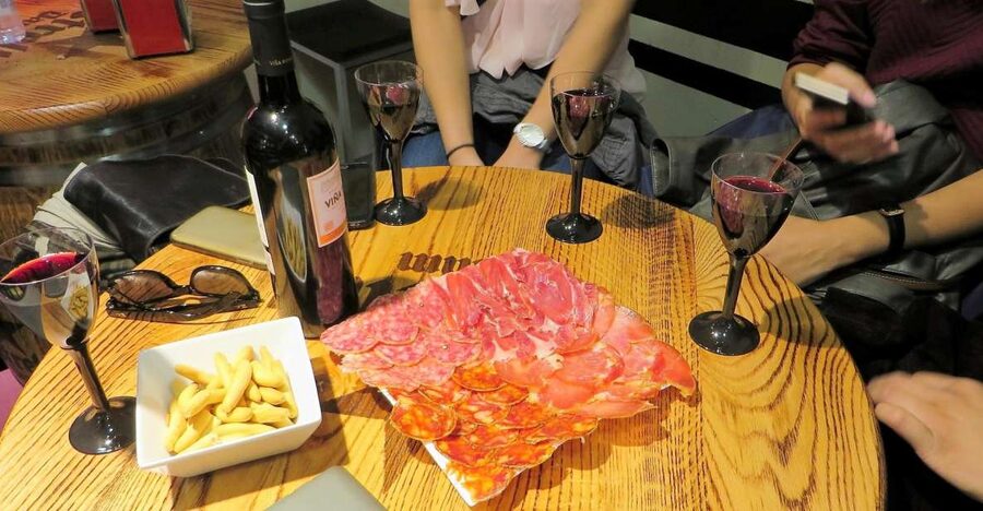 Madrid: Iberico Ham and Spanish Wine Small-Group Food Tour - Meeting at Plaza Isabel II near Opera
