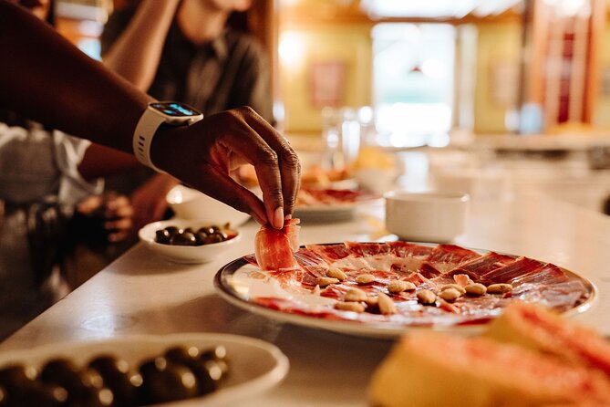 Madrid Tapas & Taverns Small Group Food & History Tour - What the guides add to the experience
