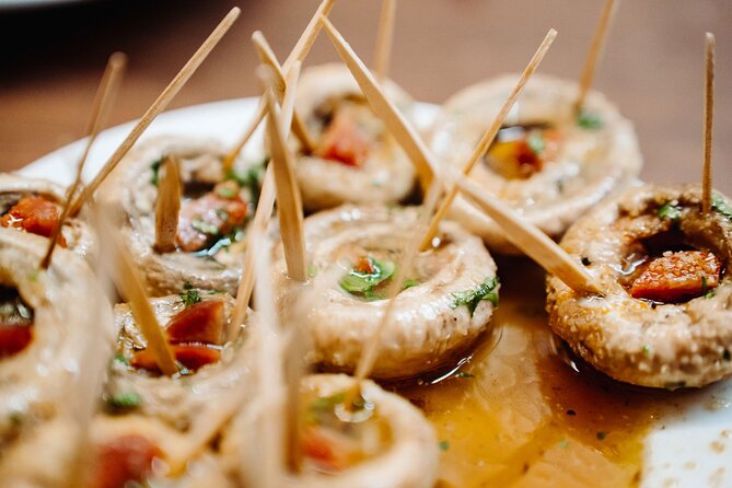 Madrid Tapas & Taverns Small Group Food & History Tour - El Escarpín brings Asturias to Madrid