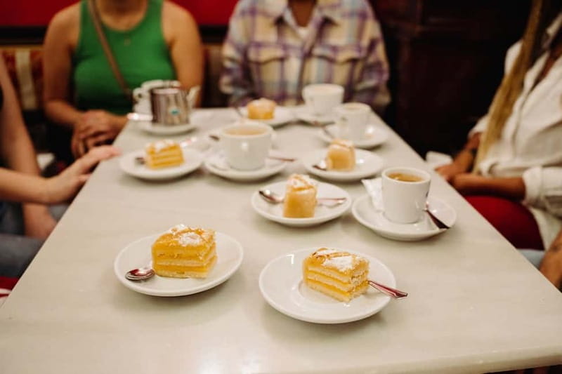 Madrid: Ultimate Food Tour of Local Markets & Tapas - The Plaza Mayor calamari sandwich