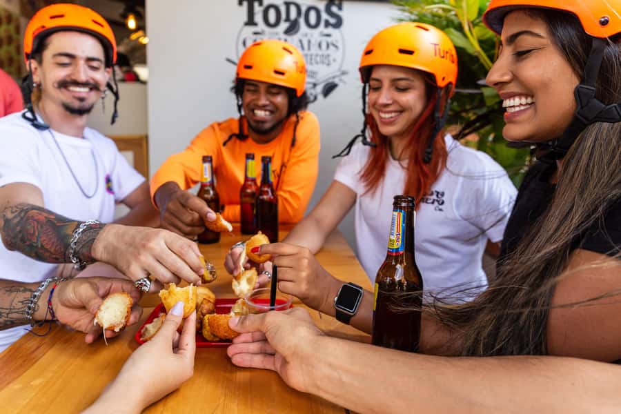 Medellín: E-bike and Foodie Tour - Laureles brings regional food and leafy streets