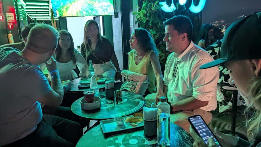 Medellin: tasting Street Food with Rooftops of El Poblado - Walking through El Poblado between food stops
