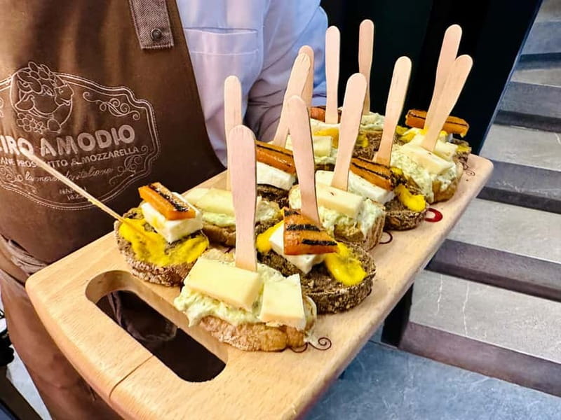 Milan: Delicious Food Tour and City Center Sightseeing - Cured meats and cheese from a local butcher