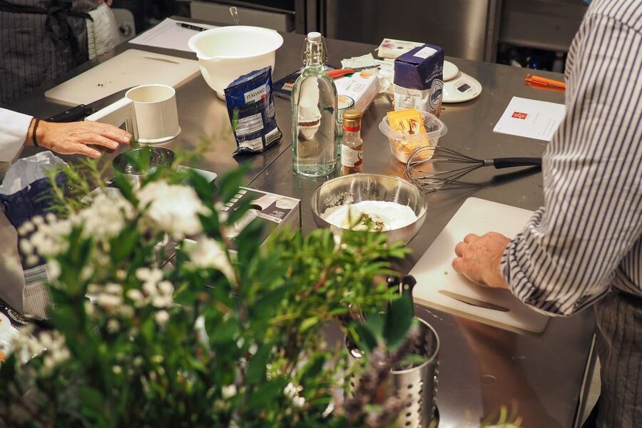 Milan: Italian Cooking Class with Food and Wine - Sitting down to eat with wine