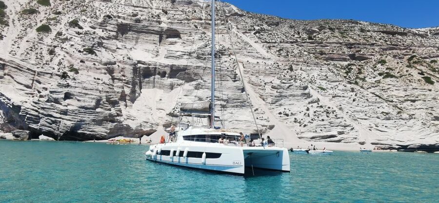 Milos: Full-Day Catamaran Cruise with Food and Open Bar - Kleftiko Caves, the signature stop