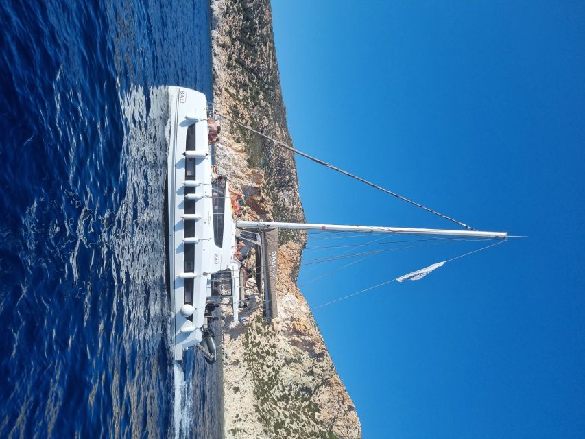 Milos: Full-Day Catamaran Cruise with Food and Open Bar - Tsigrado and the south coast