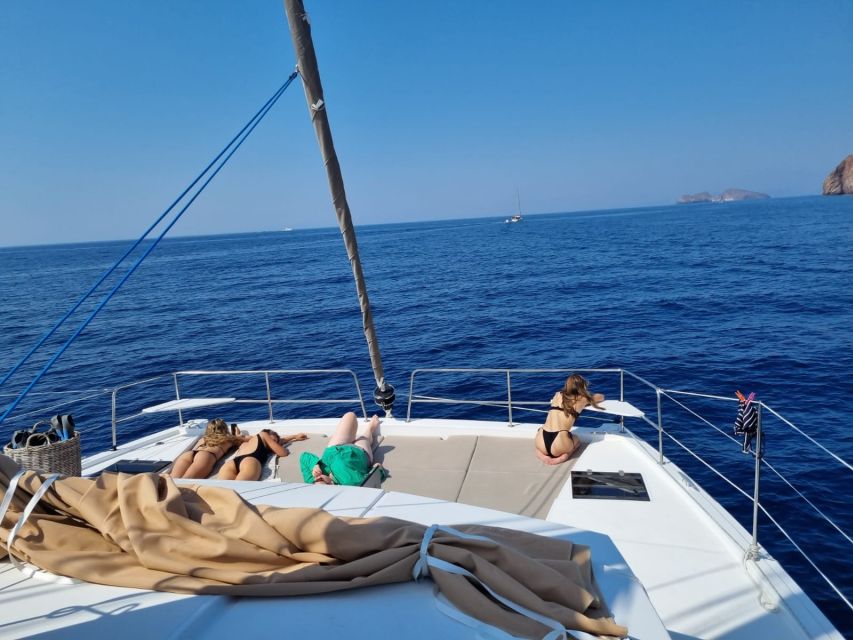 Milos: Full-Day Catamaran Cruise with Food and Open Bar - Meeting the Together catamaran in Adamantas