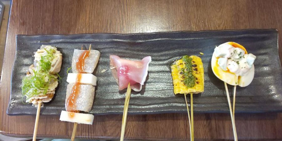 Osaka: Shinsekai Food Tour with 13-15 Dishes at 5 Eateries - The final stop: tonpeiyaki, karaage, and a last drink