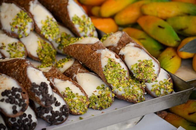 Palermo Evening Food & Wine Tour with Eating Europe - Walking through La Kalsa after dark
