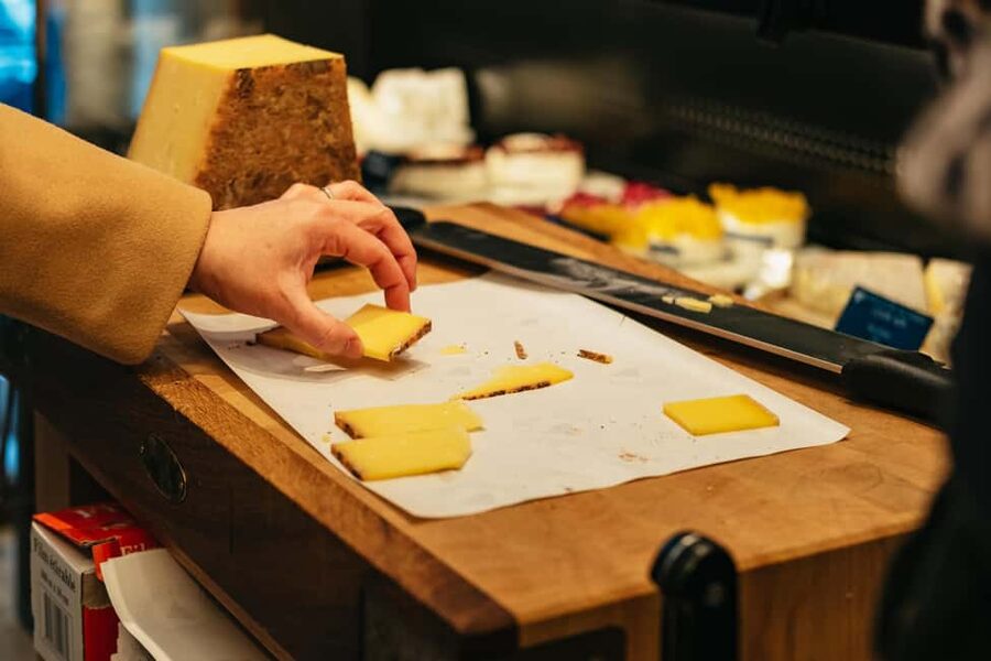 Paris: Gourmet Food Tour with Over 10 Tastings and Wine - Cheese, charcuterie, and wine at a real sitting
