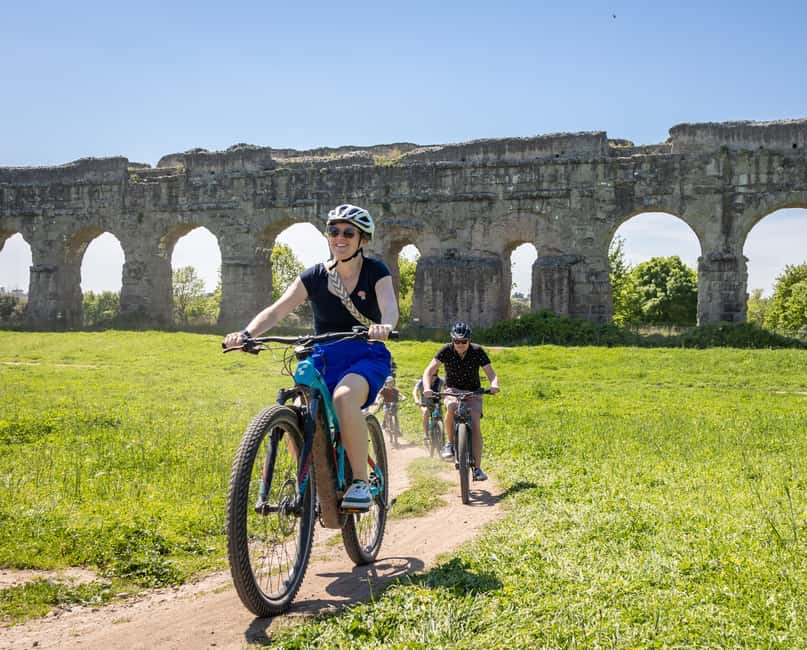 Rome: Appian Way & Aqueducts E-Bike Tour (Catacombs & Food) - Riding the Appian Way past ancient ruins