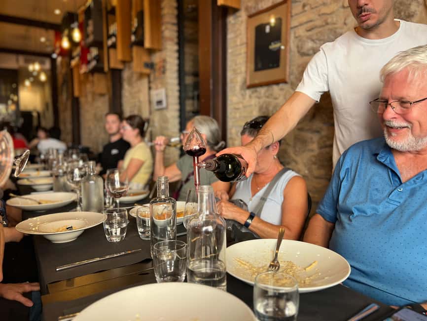 Rome: Gourmet Food Tour with Dinner & Barolo Wine - Paciotti Salumeria turns dinner into a family affair