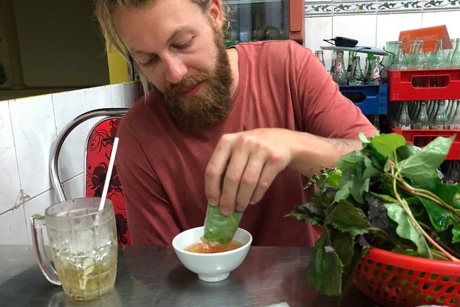 Saigon By Night and Street Food By Motorbike | Opt: Ao Dai Riders - Nguyen Trai Street, where the city keeps moving