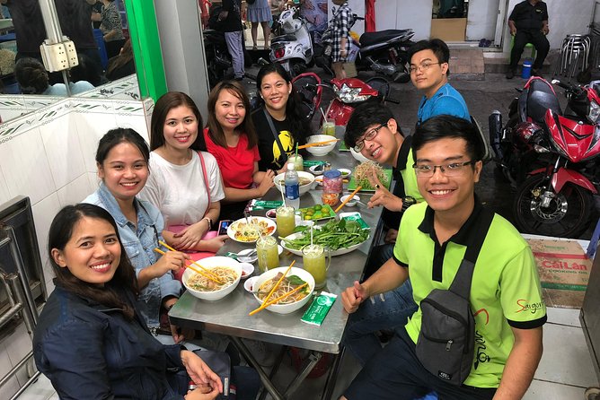 Saigon By Night and Street Food By Motorbike | Opt: Ao Dai Riders - District 4 and the final bowl of noodles