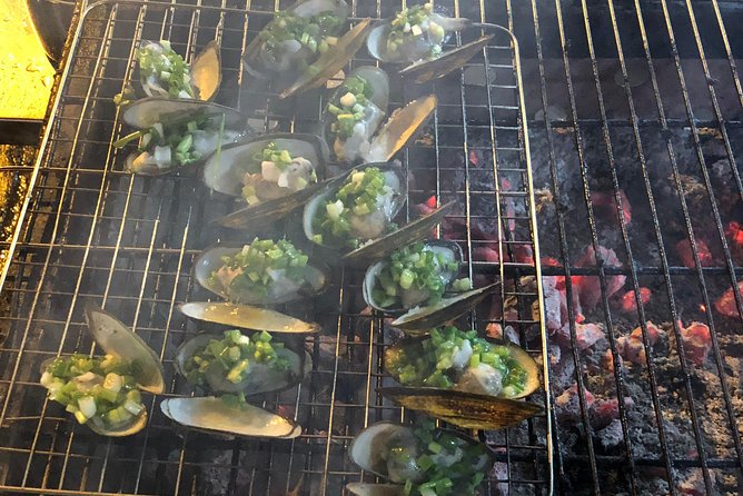 Saigon By Night and Street Food By Motorbike | Opt: Ao Dai Riders - The food is the point, but the guides make it work